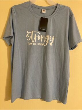 'Stronger Than The Storm' Light Blue Graphic Tee
